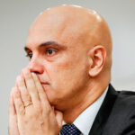 Alexandre de Moraes do STF maos juntas
