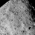 rocha de Bennu, um asteroide rico em Carbono, descoberto em 1999 e classificado como “objeto próximo à Terra”