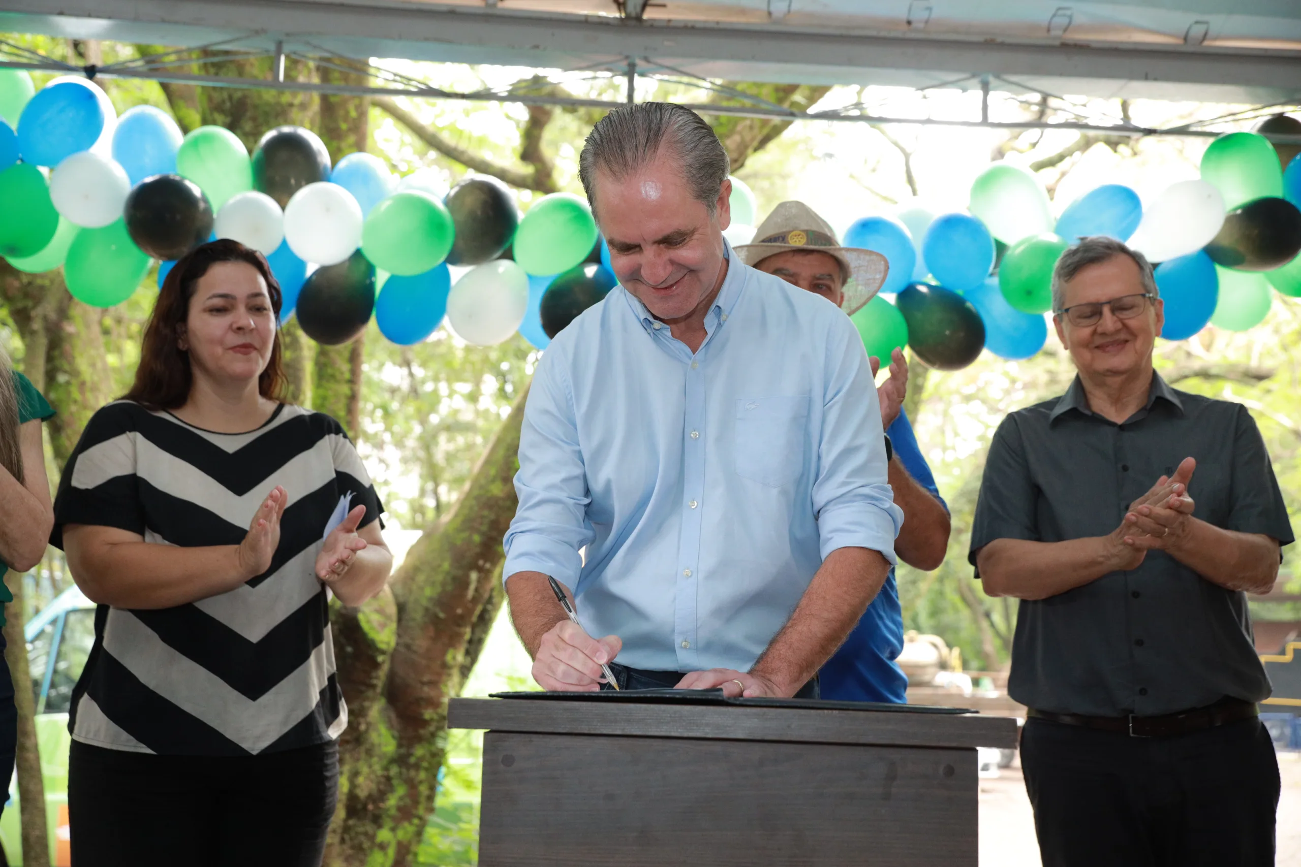 a man signing a document